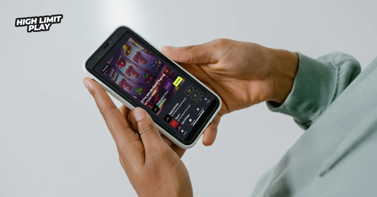 Person holding a smartphone with a screen showing a slot game interface, emblematic of online casinos with welcome bonus features.